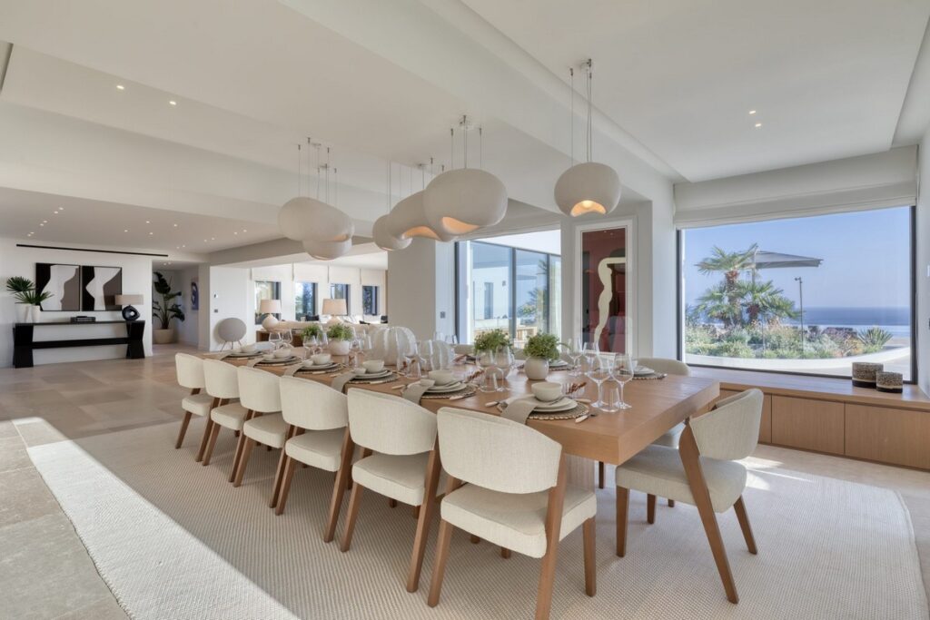 Mykonos Luxury Villa Rentals - A dining area inside a spacious Mykonos villa 